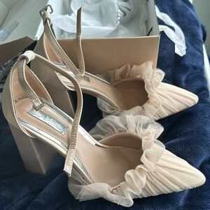 Never worn, size 7 Be Mine heels